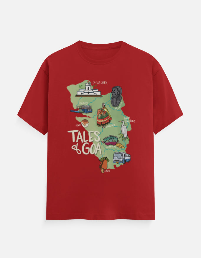 Model in a black Oipatrao x Tales of Goa tee with illustrated Goan landmarks and cultural motifs, captured at a local Goan market.