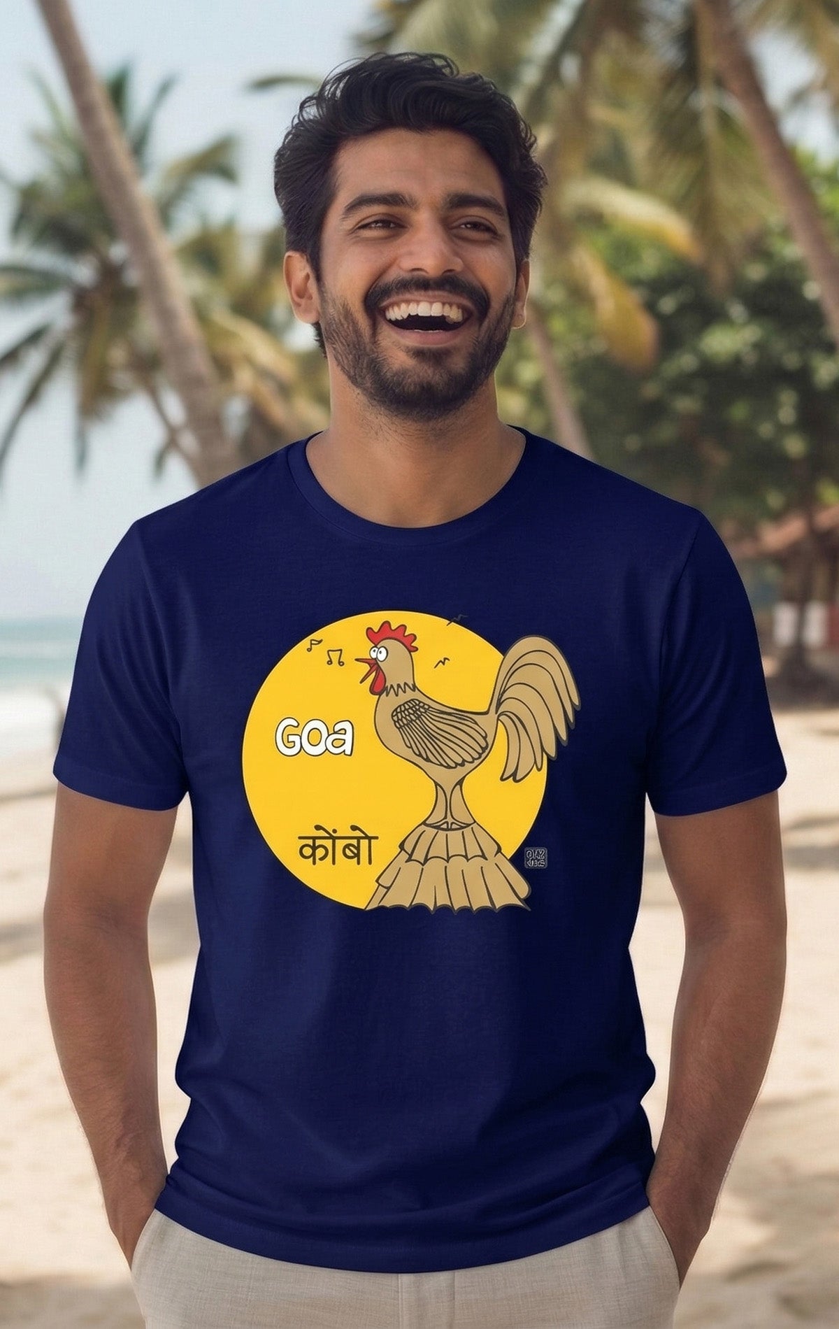 Royal blue Goa Kombo graphic t-shirt with quirky rooster illustration, musical notes, and sun backdrop
