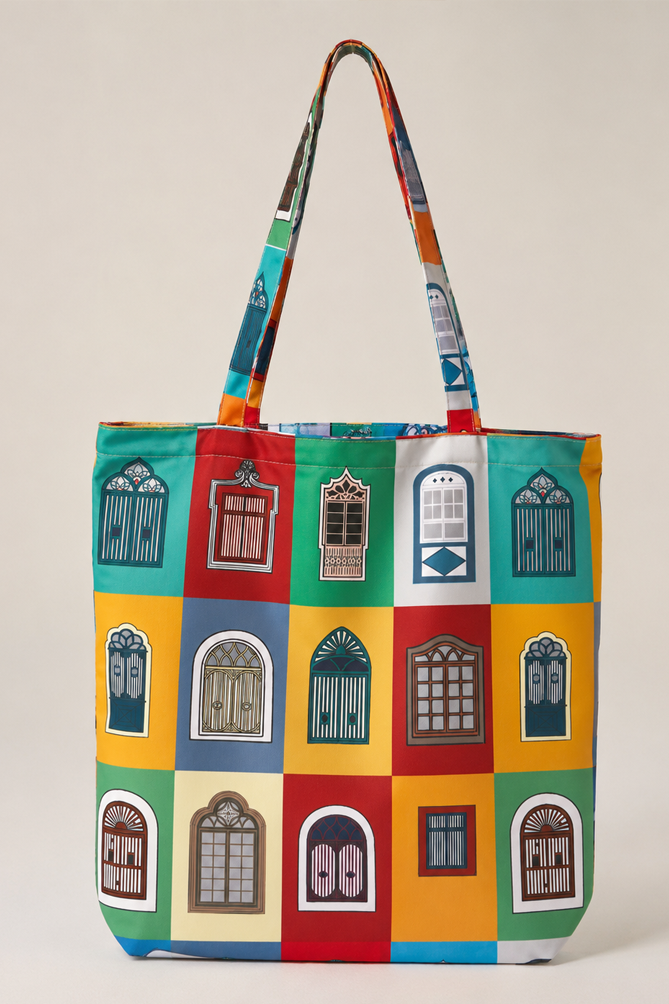 Windows of Goa tote bag featuring colourful traditional Goan window illustrations inspired by Fontainhas heritage homes.